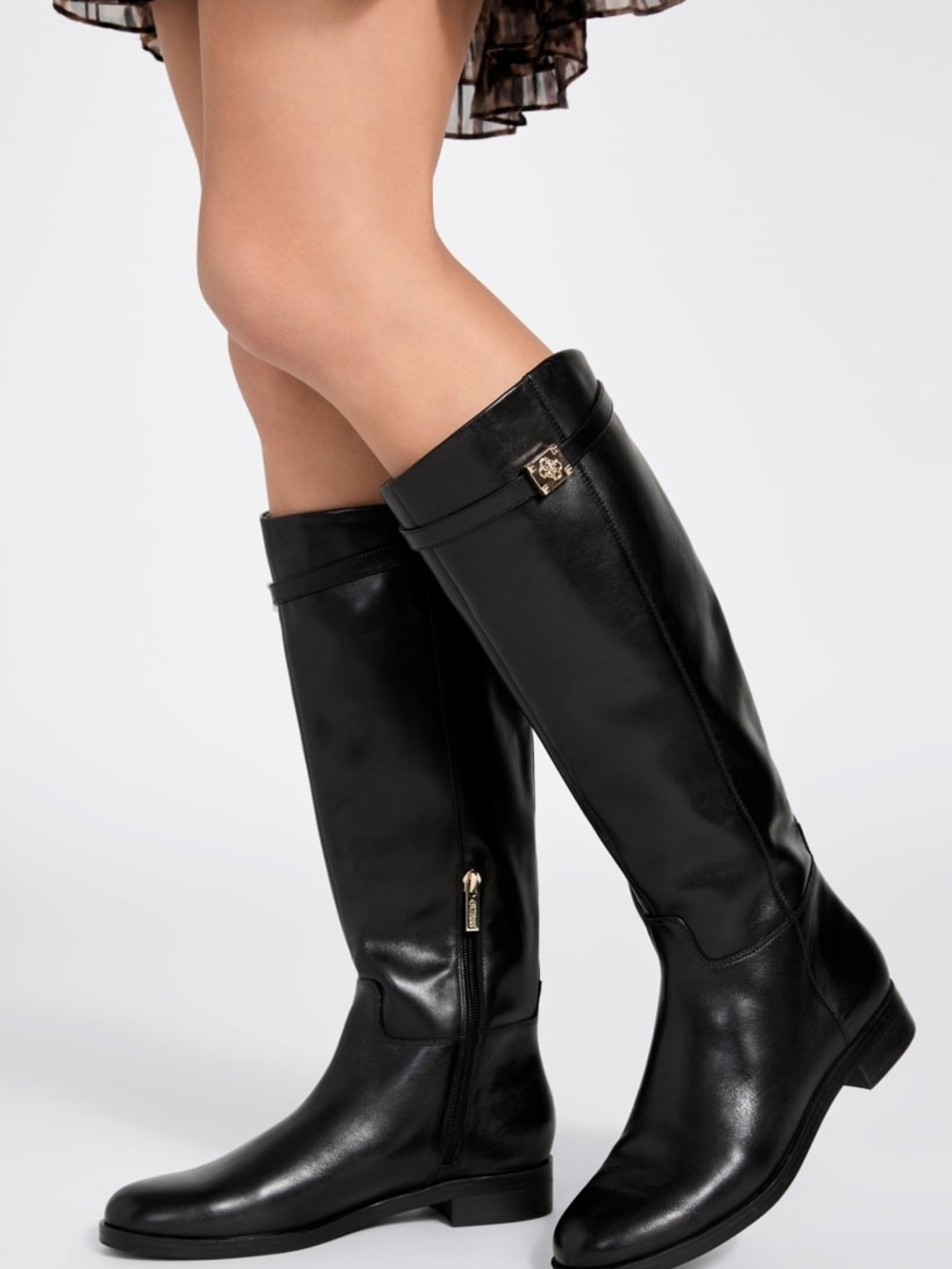 The GUESS Zoro riding boot is a beautiful silhouette Size 7m